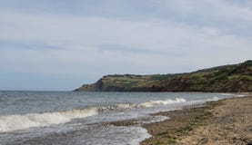 Mening van Raven Hall, in Ravenscar, van Boggle-Gat royalty-vrije stock afbeelding Mening van Raven Hall, in Ravenscar, van Boggle-Gat royalty-vrije stock afbeelding