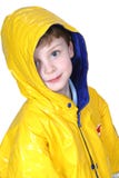Menino adorável dos anos de idade quatro no revestimento de chuva foto de stock Menino adorável dos anos de idade quatro no revestimento de chuva foto de stock