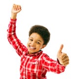 Menino de escola feliz que mostra os polegares acima foto de stock royalty free Menino de escola feliz que mostra os polegares acima foto de stock royalty free