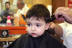 Menino no barbeiro imagens de stock royalty free Menino no barbeiro imagens de stock royalty free