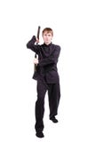 Mens in een kimono het praktizeren kungfu met nunchaku stock afbeelding Mens in een kimono het praktizeren kungfu met nunchaku stock afbeelding