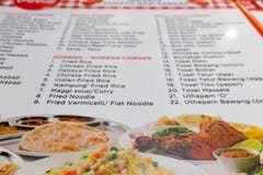 Menu de photo de restaurant indien de plage en Malaisie photo libre de droits Menu de photo de restaurant indien de plage en Malaisie photo libre de droits