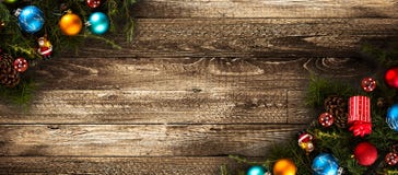 Merry Christmas Frame with real wood green pine and colorful baubles, stock image Merry Christmas Frame with real wood green pine and colorful baubles, stock image