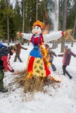Merry dance around the burning effigy of Maslenitsa, on March 13, 2016. royalty free stock photography Merry dance around the burning effigy of Maslenitsa, on March 13, 2016. royalty free stock photography
