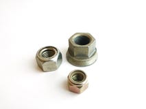 Metal hexagon nuts of different sizes royalty free stock images Metal hexagon nuts of different sizes royalty free stock images