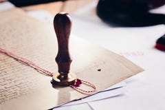 Metal notary public wax stamper on old document royalty free stock photography Metal notary public wax stamper on old document royalty free stock photography
