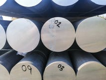 Metals and aluminium heap in the warehouse cargo for transportation to manufacturing factory stock image Metals and aluminium heap in the warehouse cargo for transportation to manufacturing factory stock image