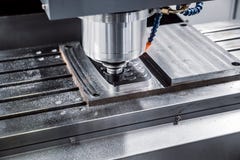 Metalworking CNC milling machine. Cutting metal modern processing technology. stock photo Metalworking CNC milling machine. Cutting metal modern processing technology. stock photo