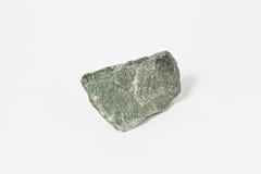 Ore green Amphibolite on white background stock images Ore green Amphibolite on white background stock images