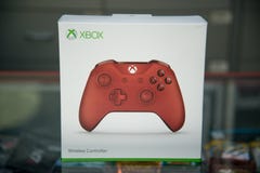 Microsoft Xbox un regulador Red Imagen de archivo Microsoft Xbox un regulador Red Imagen de archivo