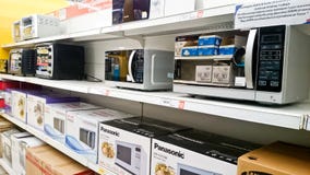 Microwave on shelf stock photo Microwave on shelf stock photo