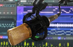 Mictophone condenser sound recorder studio with software in computer screen behind stock photo Mictophone condenser sound recorder studio with software in computer screen behind stock photo