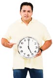 Mid Adult Man Pointing At Clock Stock Image