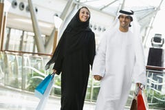 A Middle Eastern couple in a shopping mall royalty free stock photo A Middle Eastern couple in a shopping mall royalty free stock photo