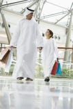 A Middle Eastern man and his son shopping stock photo A Middle Eastern man and his son shopping stock photo