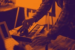 Midi keyboard and laptop - the process of recording music stock photos Midi keyboard and laptop - the process of recording music stock photos