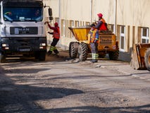 Road construction workers smiling , laughing at the end of the workday. stock image Road construction workers smiling , laughing at the end of the workday. stock image