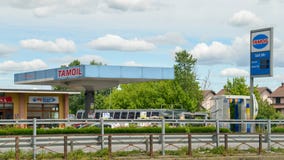 Tamoil gas station prices near Milan. Tamoil is part of Oilinvest. As of 2013 Tamoil had 2,462 service stations. Stock Images Tamoil gas station prices near Milan. Tamoil is part of Oilinvest. As of 2013 Tamoil had 2,462 service stations. Stock Images