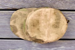 Military cap on wood, top view. stock photos Military cap on wood, top view. stock photos