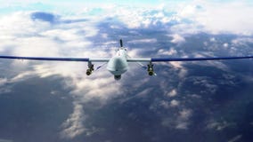 Military predator drone flying closeup