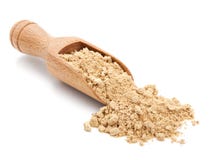 Milled ginger on white Royalty Free Stock Photography Milled ginger on white Royalty Free Stock Photography