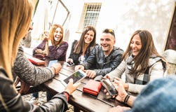 Millennial friends group having fun using mobile smart phone - Y