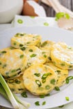 Mini frittatas with peas, green onion and feta royalty free stock photos Mini frittatas with peas, green onion and feta royalty free stock photos