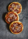 Mini Salami Pizza On A Dark Wooden Background Stock Image Mini Salami Pizza On A Dark Wooden Background Stock Image
