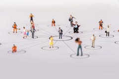 Miniature People Family In Diagrams Stock Photos