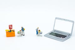 Miniature people : Shoppers for online and offline businesses. Image use for retail business, marketing place concept