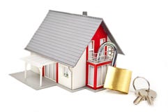 Miniatuurhuis met een slot royalty-vrije illustratie Miniatuurhuis met een slot royalty-vrije illustratie