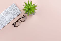 Minimal workspace with technology equipment on pastel pink background stock photos Minimal workspace with technology equipment on pastel pink background stock photos