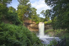 Minnehaha Falls in Minneapolis, Minnesota on a summer morning royalty free stock photo Minnehaha Falls in Minneapolis, Minnesota on a summer morning royalty free stock photo