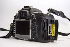 Mirror camera with open cover on memory cards. royalty free stock image Mirror camera with open cover on memory cards. royalty free stock image