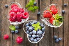 Mix Of Fresh Berries In Three Glass Ramekins In Shape Of Heart, Stock Photography Mix Of Fresh Berries In Three Glass Ramekins In Shape Of Heart, Stock Photography