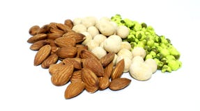 Mixed Almonds, peanuts and green peas on background stock photo Mixed Almonds, peanuts and green peas on background stock photo