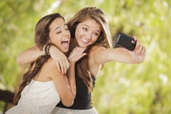 Mixed Race Girlfriends Self Portrait With Camera Royalty Free Stock Photos