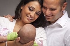 Mixed Race Young Family With Newborn Baby Royalty Free Stock Image