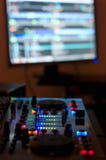 Mixing music in home audio studio stock photo Mixing music in home audio studio stock photo