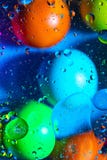 Mixing water and oil on a beautiful color abstract background gradient balls circles and ovals royalty free stock photos Mixing water and oil on a beautiful color abstract background gradient balls circles and ovals royalty free stock photos