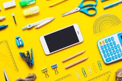 Mock up blank screen mobile phone for back to school background concept. School items background with copy space, top view flat royalty free stock photo Mock up blank screen mobile phone for back to school background concept. School items background with copy space, top view flat royalty free stock photo