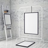 Mock up poster frames hanging on clothes rack in vintage hipster loft interior background, Stock Photography Mock up poster frames hanging on clothes rack in vintage hipster loft interior background, Stock Photography