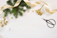 Mockup Christmas Decor Top View And Gold Ribbon, Flatlay On A White Wooden Background, With Place For Your Text Stock Photos Mockup Christmas Decor Top View And Gold Ribbon, Flatlay On A White Wooden Background, With Place For Your Text Stock Photos