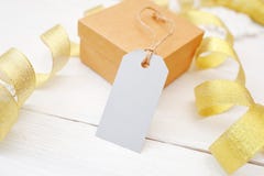 Mockup Christmas Gift With Blank Tag On White Wooden Background With Gold Ribbon Royalty Free Stock Image Mockup Christmas Gift With Blank Tag On White Wooden Background With Gold Ribbon Royalty Free Stock Image