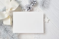 Mockup Christmas Greeting Card With White Tree And Cone, Flatlay On A White Wooden Background, With Place For Your Text Stock Photos Mockup Christmas Greeting Card With White Tree And Cone, Flatlay On A White Wooden Background, With Place For Your Text Stock Photos