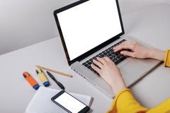 Mockup image cell phone,computer hand typing with blank screen for text, girl using laptop and searching information stock photos Mockup image cell phone,computer hand typing with blank screen for text, girl using laptop and searching information stock photos