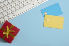 Mockup Of Two Blank Color Credit Cards, Gift Box On Empty Blue Desk Background. Business Mock-up Background For Message Royalty Free Stock Image Mockup Of Two Blank Color Credit Cards, Gift Box On Empty Blue Desk Background. Business Mock-up Background For Message Royalty Free Stock Image