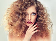 Model with curly hair stock photos Model with curly hair stock photos