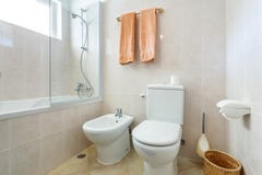 Modern Bathroom Shower Room With Toilet And Amenities. Stock Photo Modern Bathroom Shower Room With Toilet And Amenities. Stock Photo