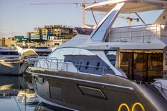 This modern black & white boat moored at the Marina stock image This modern black & white boat moored at the Marina stock image